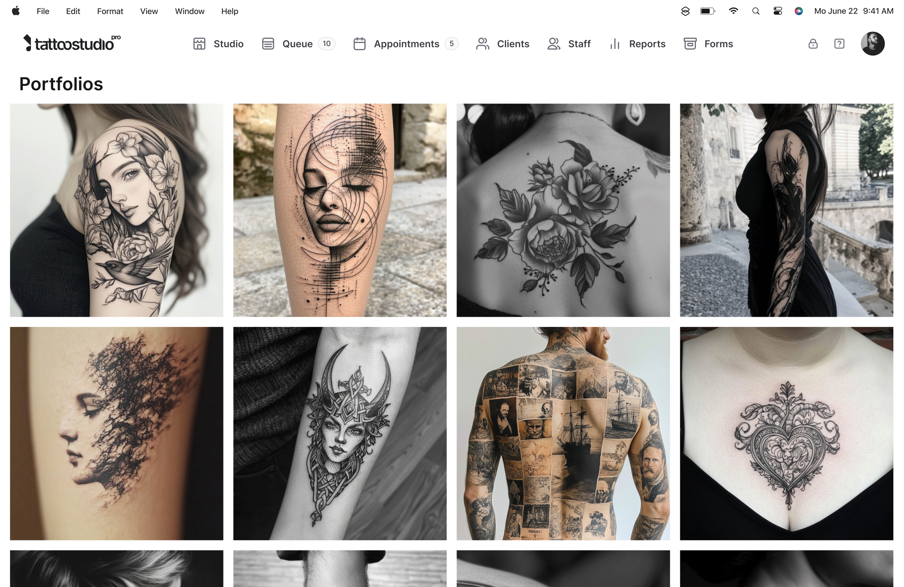 Artist portfolios in Tattoo Studio Pro on a laptop